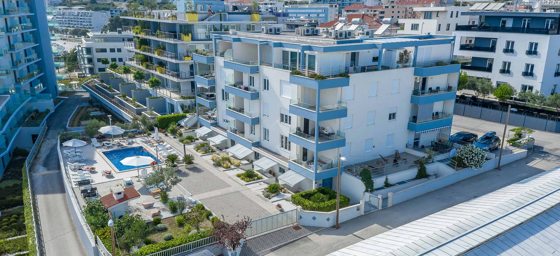 Aerial view of the Seaside building, pool and shared terrace